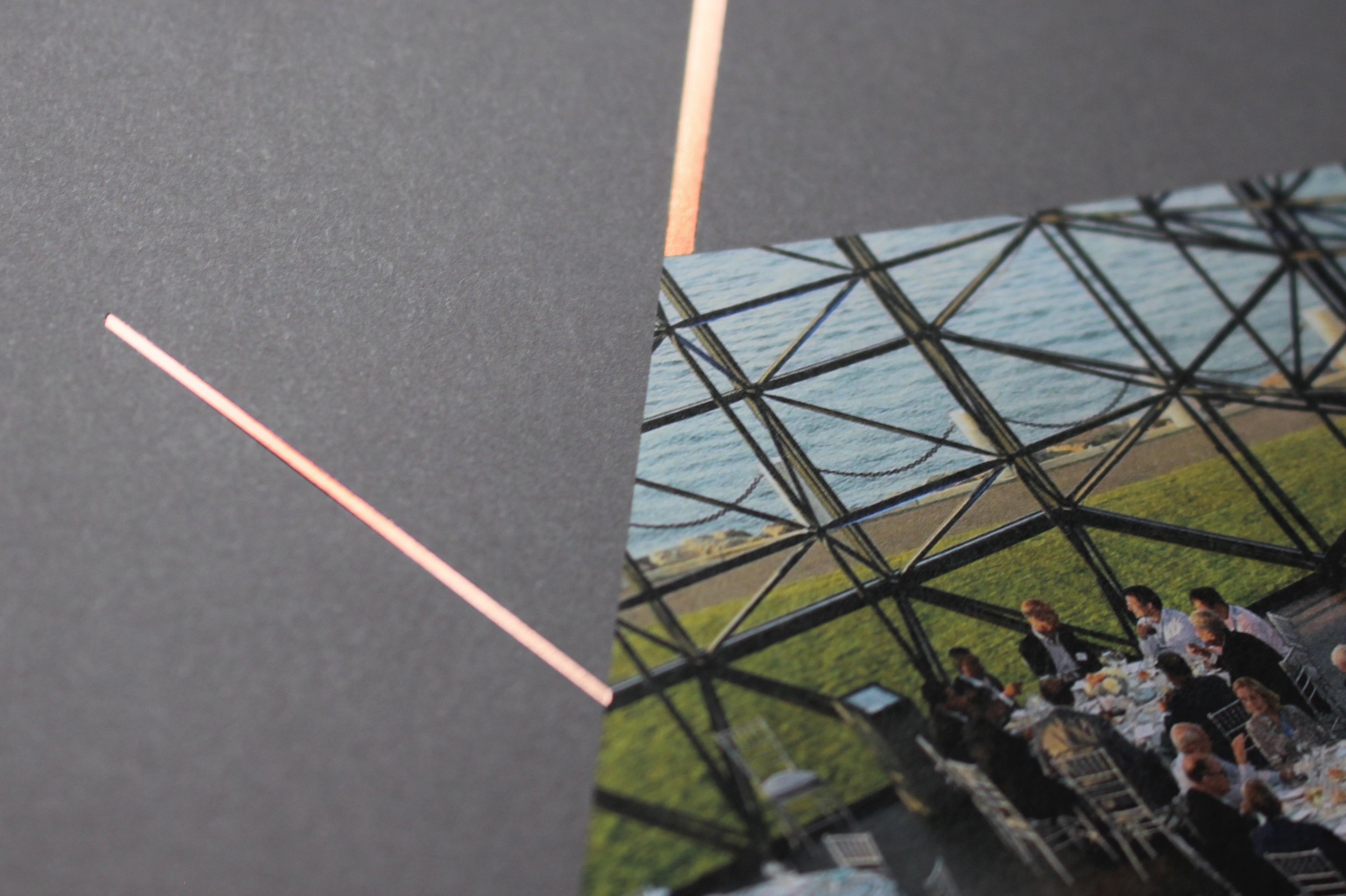 Embossed map pattern detail on a textured cover