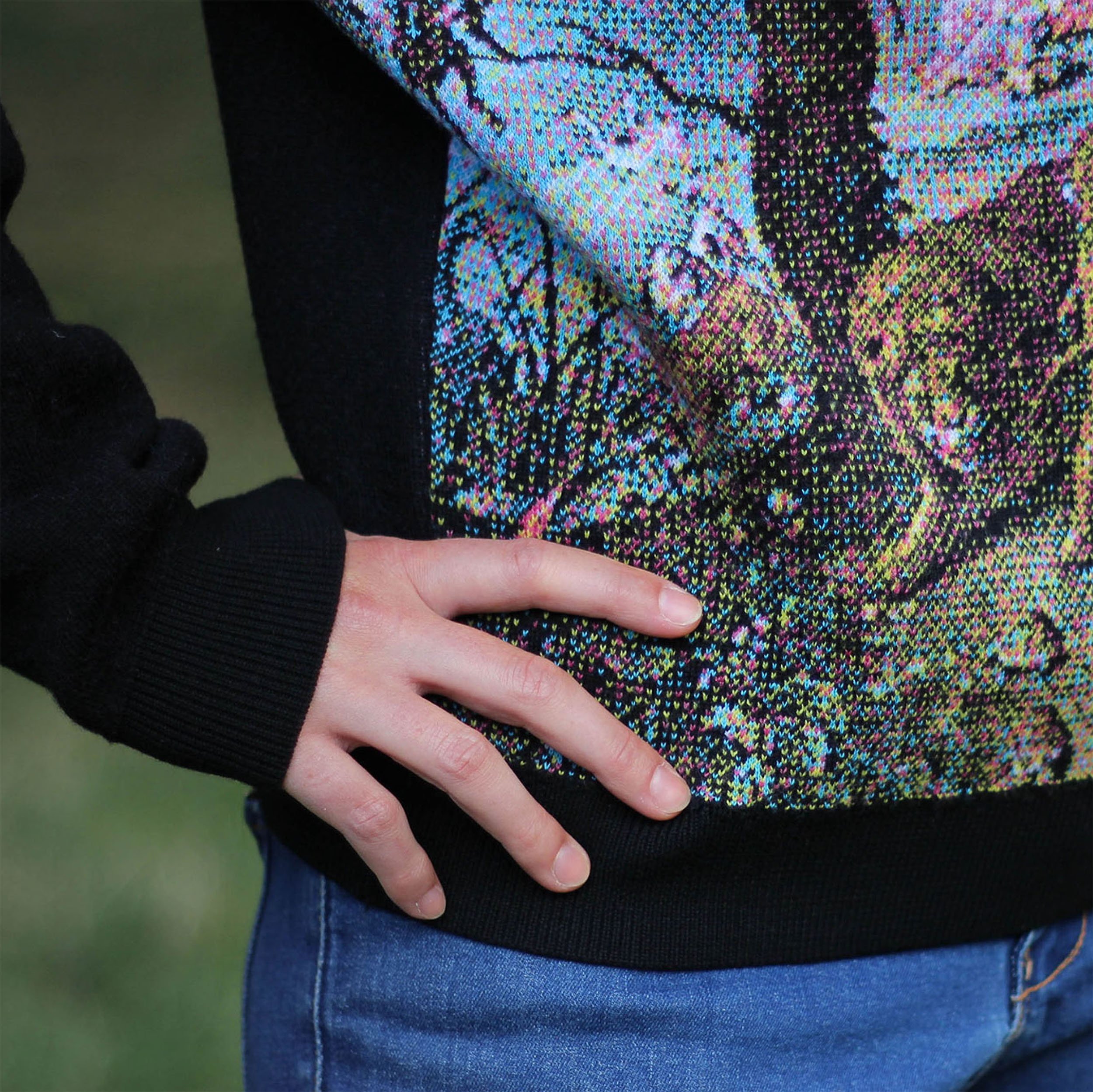 Pento jumper styled with high-waisted trousers