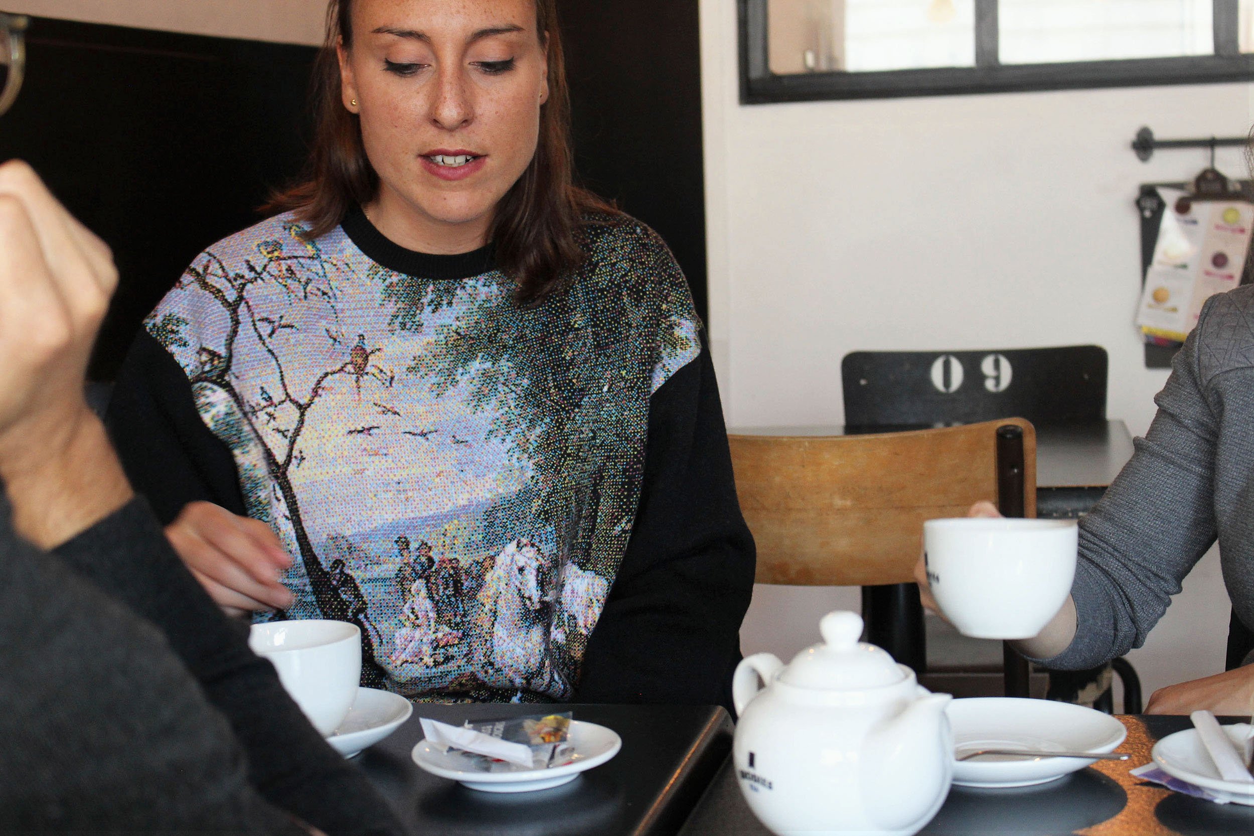 Three-quarter editorial portrait wearing a Pento jumper