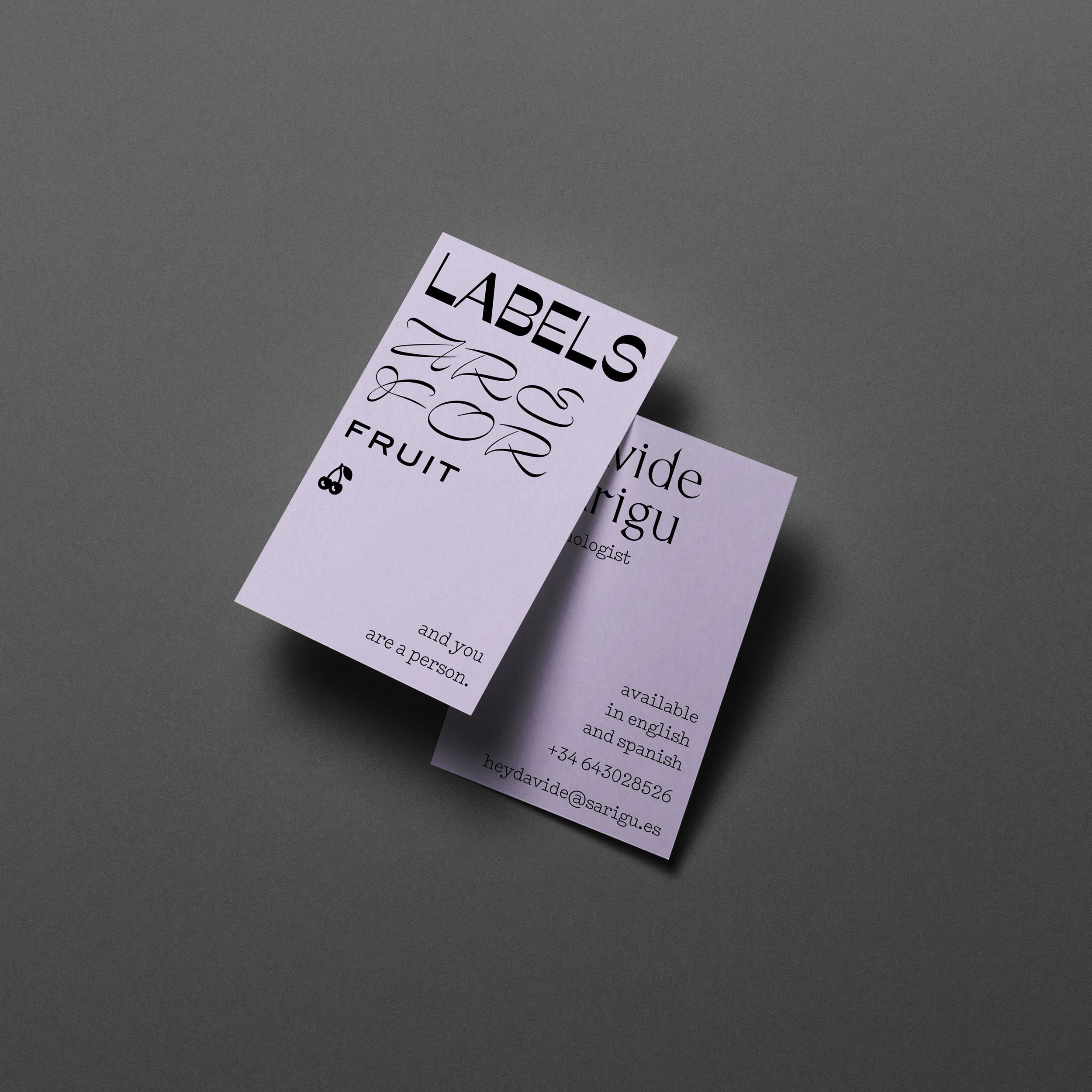 Davide Sarigu business card on pastel paper with minimal typographic layout